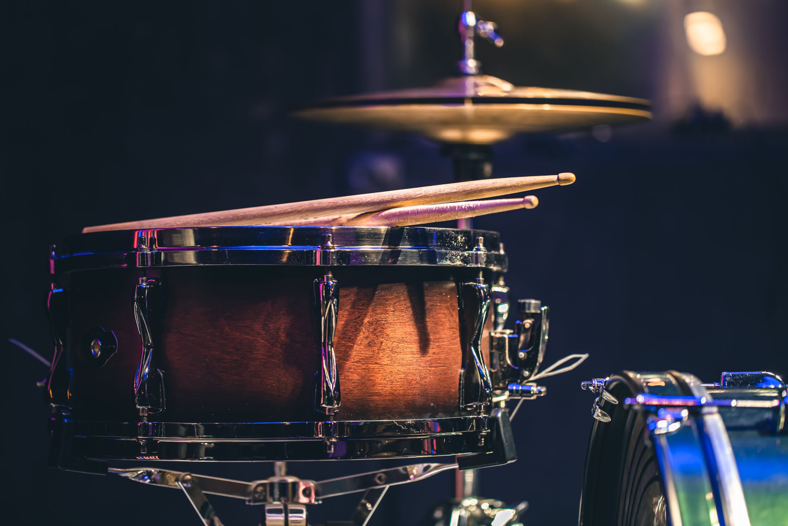 https://www.freepik.com/free-photo/closeup-part-drum-kit-blurred-background_31621865.htm